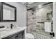 Modern bathroom with a glass shower and marble tile at 2371 Shipwatch Rd, Kiawah Island, SC 29455