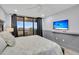 Bedroom with ocean view, queen bed, and TV at 2371 Shipwatch Rd, Kiawah Island, SC 29455