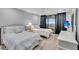 Guest bedroom with two twin beds and ocean view at 2371 Shipwatch Rd, Kiawah Island, SC 29455
