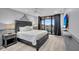 Bedroom with a queen bed and ocean view balcony at 2371 Shipwatch Rd, Kiawah Island, SC 29455