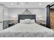 Main bedroom with a queen-size bed and gray accents at 2371 Shipwatch Rd, Kiawah Island, SC 29455