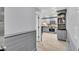 View of the kitchen from entryway with gray wainscoting at 2371 Shipwatch Rd, Kiawah Island, SC 29455