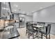 Modern kitchen with gray cabinets and granite countertops at 2371 Shipwatch Rd, Kiawah Island, SC 29455