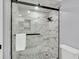 Large shower with marble tile and glass enclosure at 2371 Shipwatch Rd, Kiawah Island, SC 29455