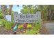 Roy Barth Tennis Center sign with landscaping at 2371 Shipwatch Rd, Kiawah Island, SC 29455