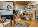Open living space with kitchen island, fireplace, and wood ceilings at 251 Driftwood Ln # 251, Edisto Island, SC 29438