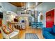 Open living space with kitchen island, spiral staircase, and wood ceilings at 251 Driftwood Ln # 251, Edisto Island, SC 29438
