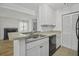 Kitchen features white cabinets, stainless steel sink, and modern appliances at 267 Alexandra # 6, Mount Pleasant, SC 29464