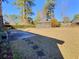 Large backyard with gazebo and mature trees at 303 Swamp Fox Ln, Goose Creek, SC 29445