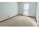 Cozy bedroom with a window and neutral wall paint at 303 Swamp Fox Ln, Goose Creek, SC 29445