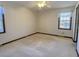 Simple bedroom with two windows and ceiling fan at 303 Swamp Fox Ln, Goose Creek, SC 29445