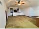 Large bonus room with carpet flooring, ceiling fan, and window at 303 Swamp Fox Ln, Goose Creek, SC 29445