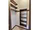 Closet with wood shelving and hanging rod at 303 Swamp Fox Ln, Goose Creek, SC 29445