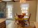 Bright dining area with a round table and chandelier at 303 Swamp Fox Ln, Goose Creek, SC 29445