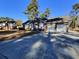Brick ranch home with a large driveway and two-car garage at 303 Swamp Fox Ln, Goose Creek, SC 29445