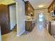 Bright kitchen with wood cabinets, new flooring and stainless steel appliances at 303 Swamp Fox Ln, Goose Creek, SC 29445