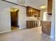 Kitchen with wood cabinets and light colored flooring at 303 Swamp Fox Ln, Goose Creek, SC 29445