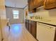 Kitchen boasts wood cabinets, updated flooring and stainless steel appliances at 303 Swamp Fox Ln, Goose Creek, SC 29445