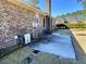 Brick patio in the backyard next to the house at 303 Swamp Fox Ln, Goose Creek, SC 29445