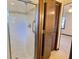 Shower features tile surround and modern fixtures, including a handheld shower head at 303 Swamp Fox Ln, Goose Creek, SC 29445
