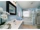 Bathroom with soaking tub, shower, and single vanity at 3100 Sonja Way, Mount Pleasant, SC 29466