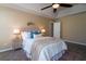 Main bedroom with carpeted floor, ceiling fan, and neutral decor at 3100 Sonja Way, Mount Pleasant, SC 29466