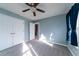 Bedroom with blue walls, ceiling fan, and carpet flooring at 3100 Sonja Way, Mount Pleasant, SC 29466