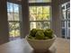 Bright dining room with hardwood floors and a farmhouse table at 3100 Sonja Way, Mount Pleasant, SC 29466