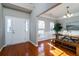Sunlit dining area with hardwood floors and a wood table at 3100 Sonja Way, Mount Pleasant, SC 29466