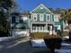 Two-story teal home with white garage door at 3100 Sonja Way, Mount Pleasant, SC 29466