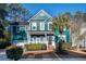 Beautiful teal two-story house with palm trees at 3100 Sonja Way, Mount Pleasant, SC 29466