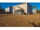 Spacious backyard with a screened porch and grill area at 3157 Timberline Dr, Johns Island, SC 29455