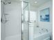 Bathroom with shower, bathtub, and window at 3157 Timberline Dr, Johns Island, SC 29455