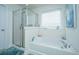Bathroom with shower, bathtub, and window at 3157 Timberline Dr, Johns Island, SC 29455