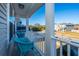 Relaxing porch with two wicker chairs, overlooking a quiet street at 3157 Timberline Dr, Johns Island, SC 29455