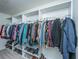 Large walk-in closet with hanging rods and shelving at 3157 Timberline Dr, Johns Island, SC 29455
