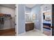 Elegant bathroom with a vanity, walk-in closet, and hardwood floors at 374 Trailmore Ln, Summerville, SC 29486