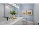 Elegant bathroom with dual vanities and a walk-in shower at 374 Trailmore Ln, Summerville, SC 29486