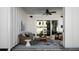 Relaxing outdoor patio with wicker furniture and a ceiling fan at 374 Trailmore Ln, Summerville, SC 29486