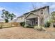 House with a fenced backyard, covered porch, and landscaping at 3765 Sawmill Ct, Mount Pleasant, SC 29429