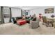 Spacious bonus room with sectional sofa and plenty of natural light at 3765 Sawmill Ct, Mount Pleasant, SC 29429