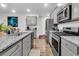 Modern kitchen with stainless steel appliances and granite countertops at 3765 Sawmill Ct, Mount Pleasant, SC 29429