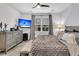 Main bedroom with dresser and comfortable king-size bed at 3765 Sawmill Ct, Mount Pleasant, SC 29429