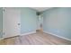 Bedroom featuring hardwood floors, a bright window, and a white closet at 4329 Spur St, North Charleston, SC 29405