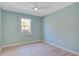 Bedroom featuring hardwood floors, a ceiling fan, and a bright window at 4329 Spur St, North Charleston, SC 29405