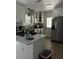 Bright kitchen featuring white cabinets and stainless steel appliances at 4329 Spur St, North Charleston, SC 29405