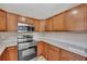 Stainless steel appliances and light wood cabinets in kitchen at 517 Travelers Blvd, Summerville, SC 29485
