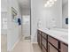 Elegant bathroom with double vanity and large mirror at 534 Mclernon Trace, Johns Island, SC 29455