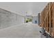 Unfinished garage with concrete floor and overhead door at 534 Mclernon Trace, Johns Island, SC 29455