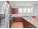 Spacious kitchen featuring granite countertops and wood cabinets at 534 Mclernon Trace, Johns Island, SC 29455